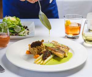 Golden Bass, White Asparagus, Morels, Cumin Pearl Barley, Parsley Sauce. Photo by Winter Caplanson, New England And Farm