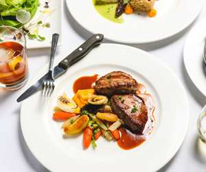 Veal Tenderloin, Butternut squash Mousseline, Vegetable Medley. Photo by Winter Caplanson, New England And Farm