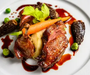 Pam roasted squab, parsnip purée, morels & English peas, port wine sauce